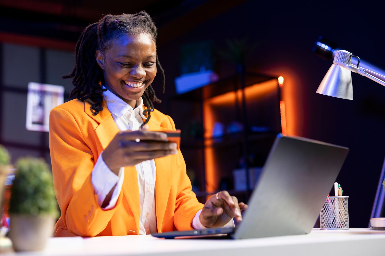A business owner taking an order from her HUB page