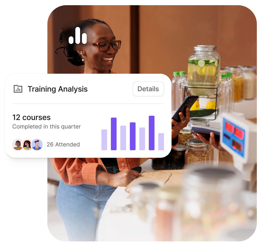 Business owner recording sales with training analytics