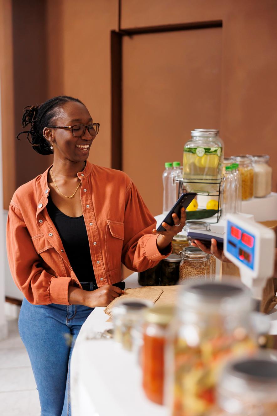 A business owner at her desk, working through her plans
